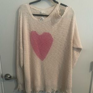 Sweetheart plus sized cold shoulder distressed sweater.